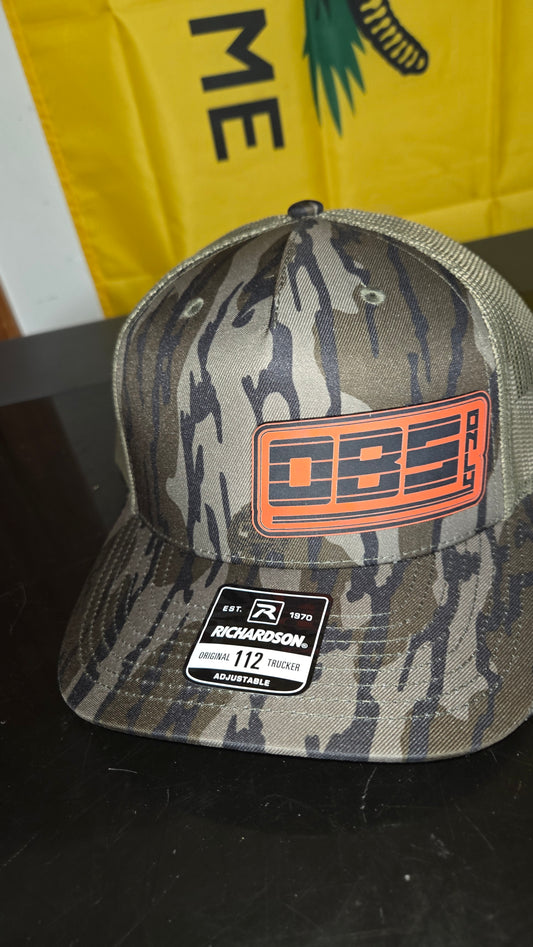Mossy oak with a orange logo